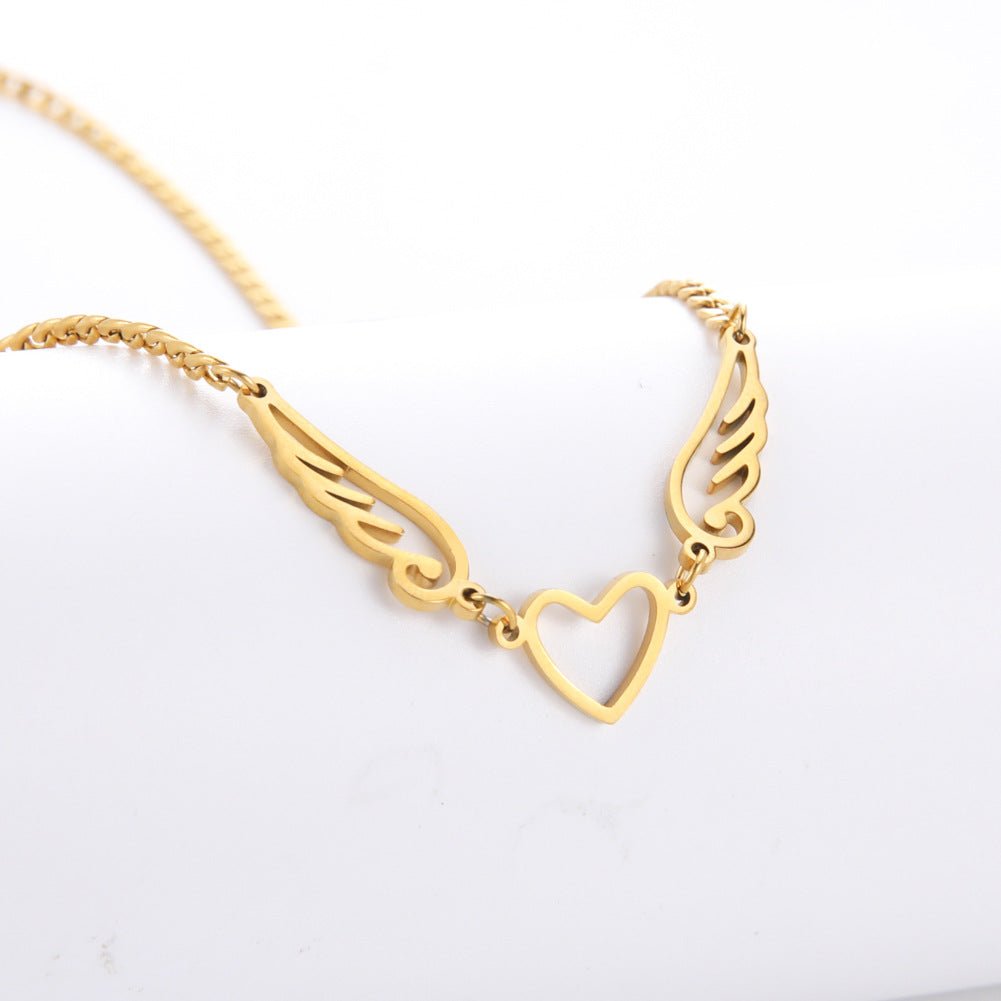 Hollow Heart Angel Wing Necklace - Serenity Spaces