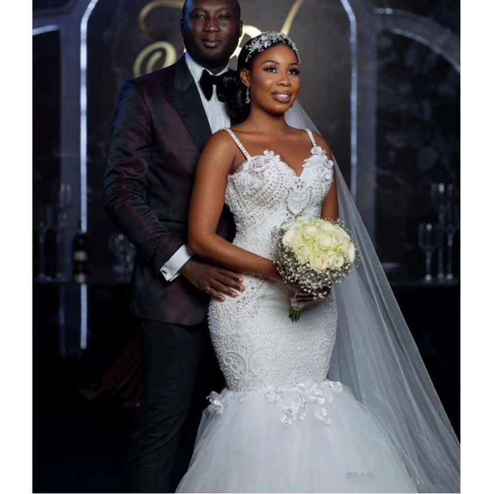 Lace sleeveless fish tail style African bridal wedding dress - Serenity Spaces